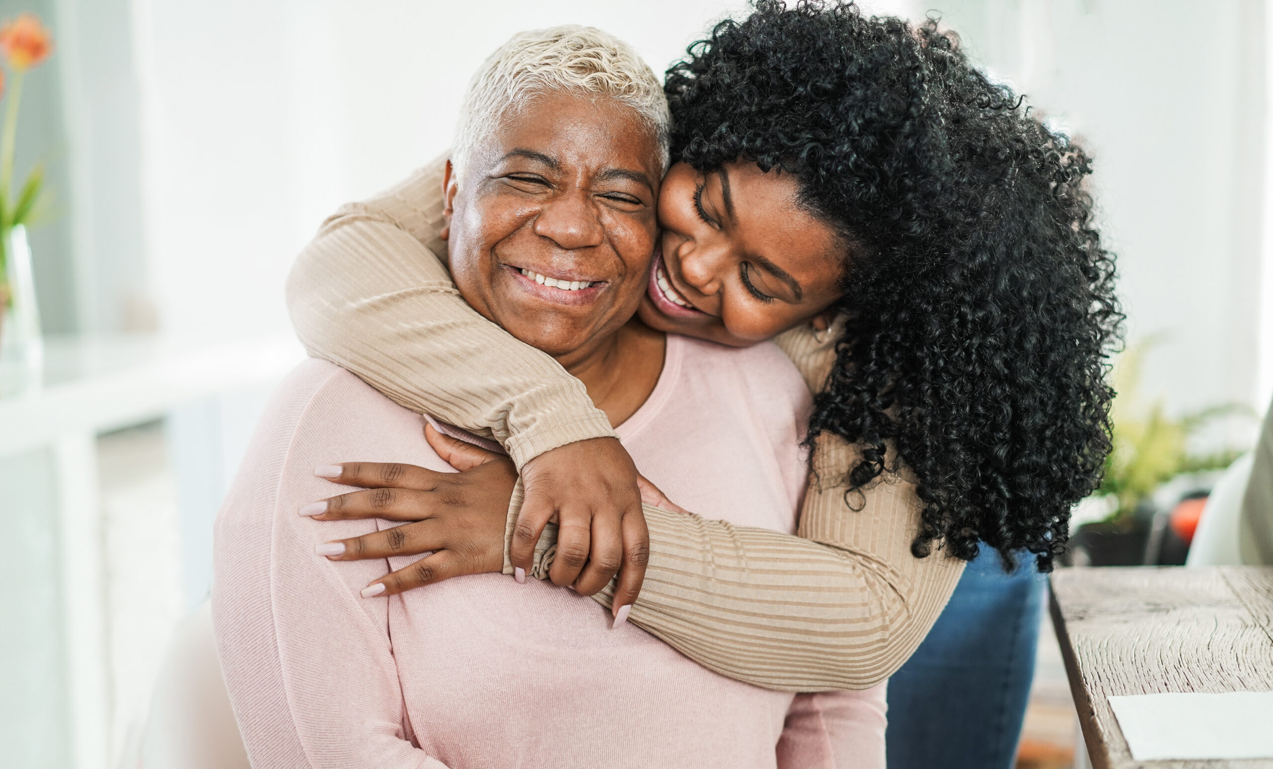 Family member supporting an older loved one